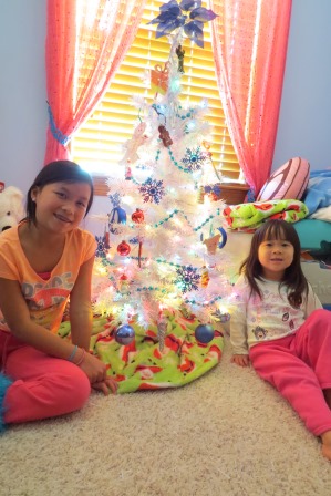 Kasen (and Karis) with her Christmas tree